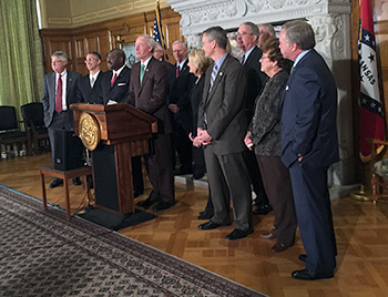 Arkansas Gov. Asa Hutchinson announces the signing of Act 893 creating the Office of Skills Development, an initiative pushed by the State Chamber/AIA, during the 2015 90th General Assembly of the Arkansas Legislature.